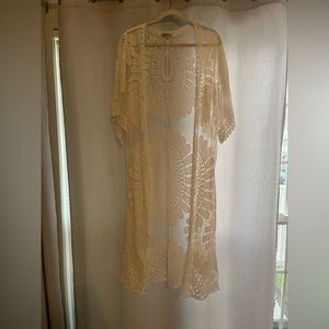 White cardigan with design